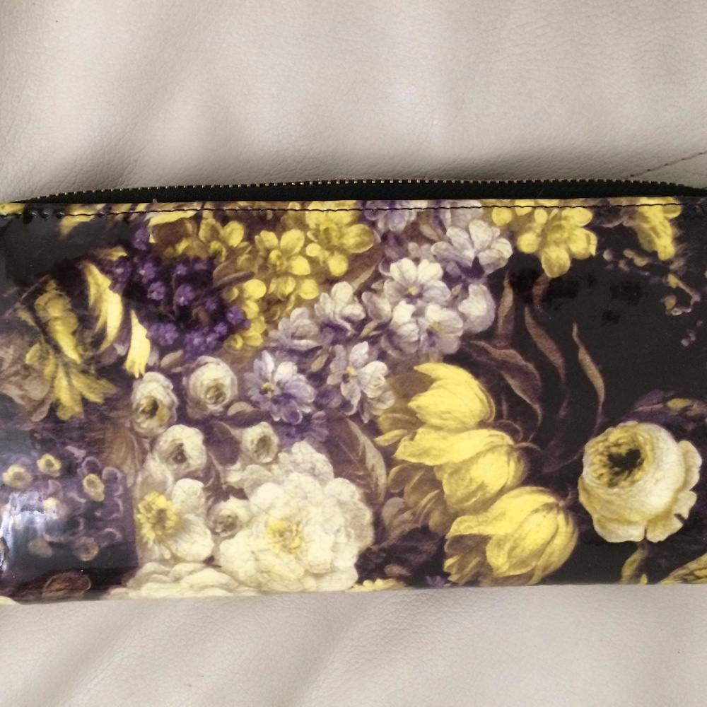 Large versatile utility wallet/clutch